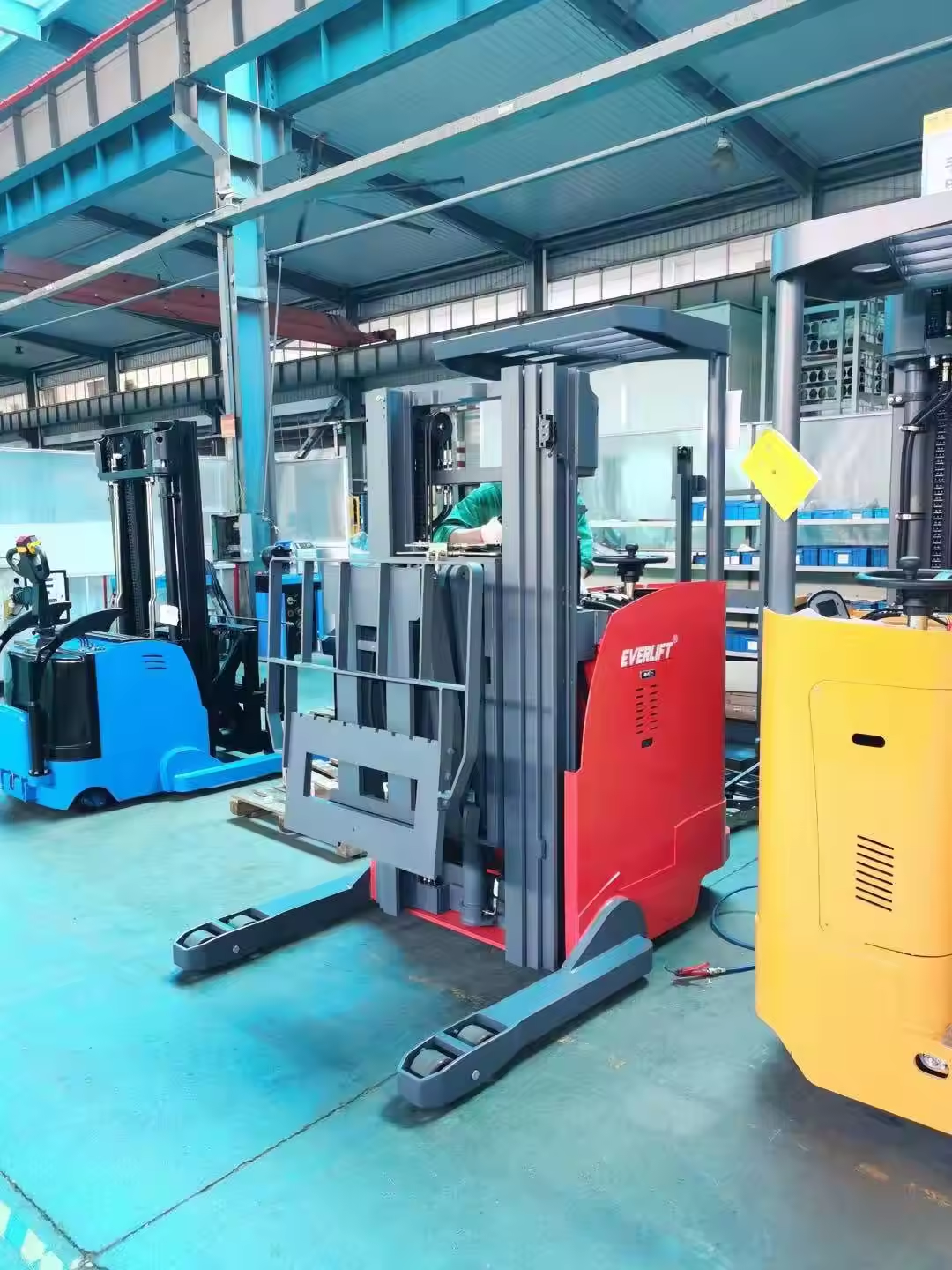 Everlift 2 Ton 6 M Double Scissor Reach Truck Electric Stacker Forklift Seated With Narrow Aisle China Forklift